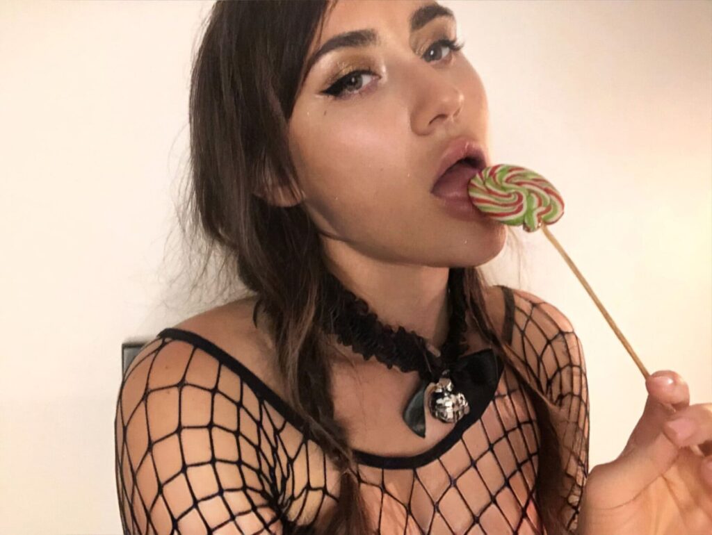 BDSM party with candy in the ass